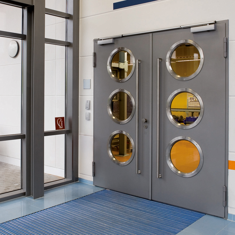High Frequency Closers Fitted To Deparetment Entrance Doors With Porthole Windows And D Handles