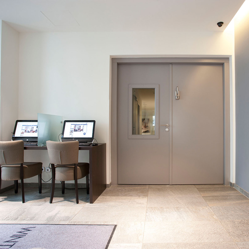 Dobele Steel Fire Door With Vision Panel Integrated Protecting A Hotel Lobby