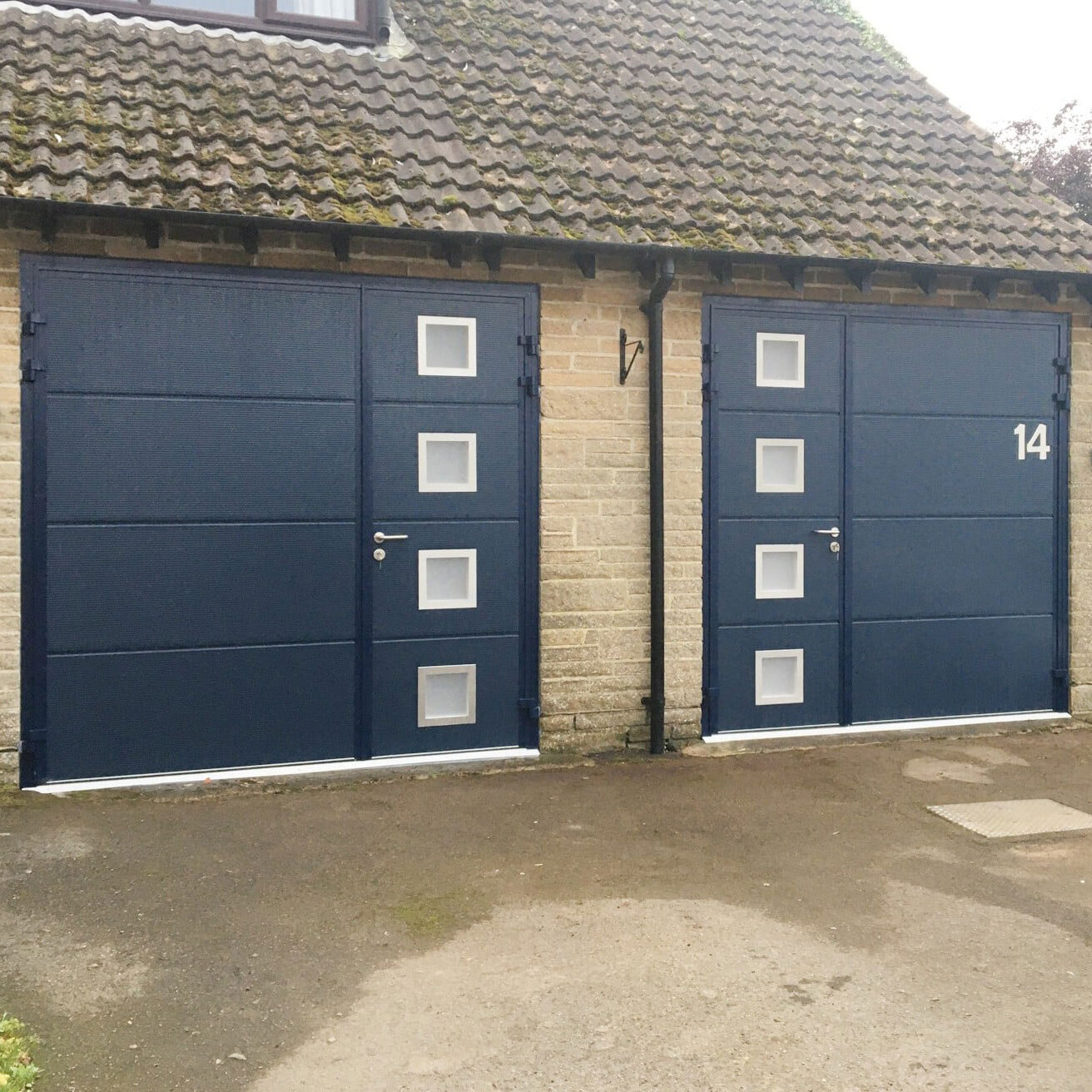 Teckentrup Carteck Side Hinged Solid Horizontal Micro Profile In Anthracite With Bling Alpha Windows And Bling Writing Decals