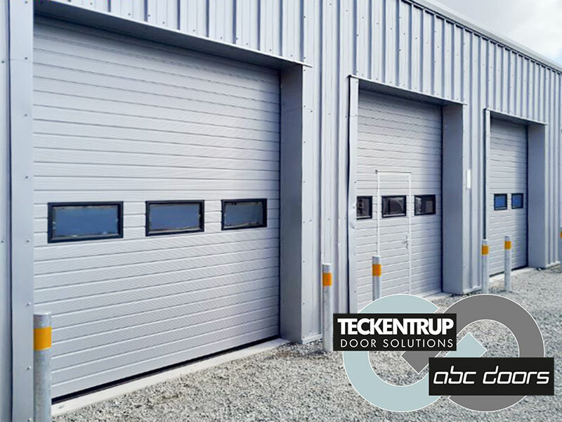 SW40 Industrial Sectional Doors At Car Workshop Facility