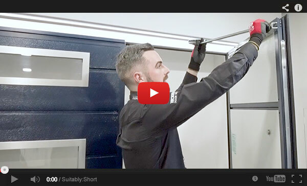 Fitting the door stay and grommets - Teckentrup Side Hinged Garage Door Fitting Video